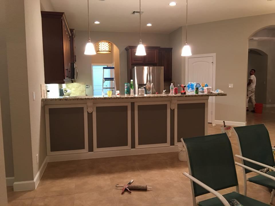 Kitchen with freshly repainted cabinets and center island