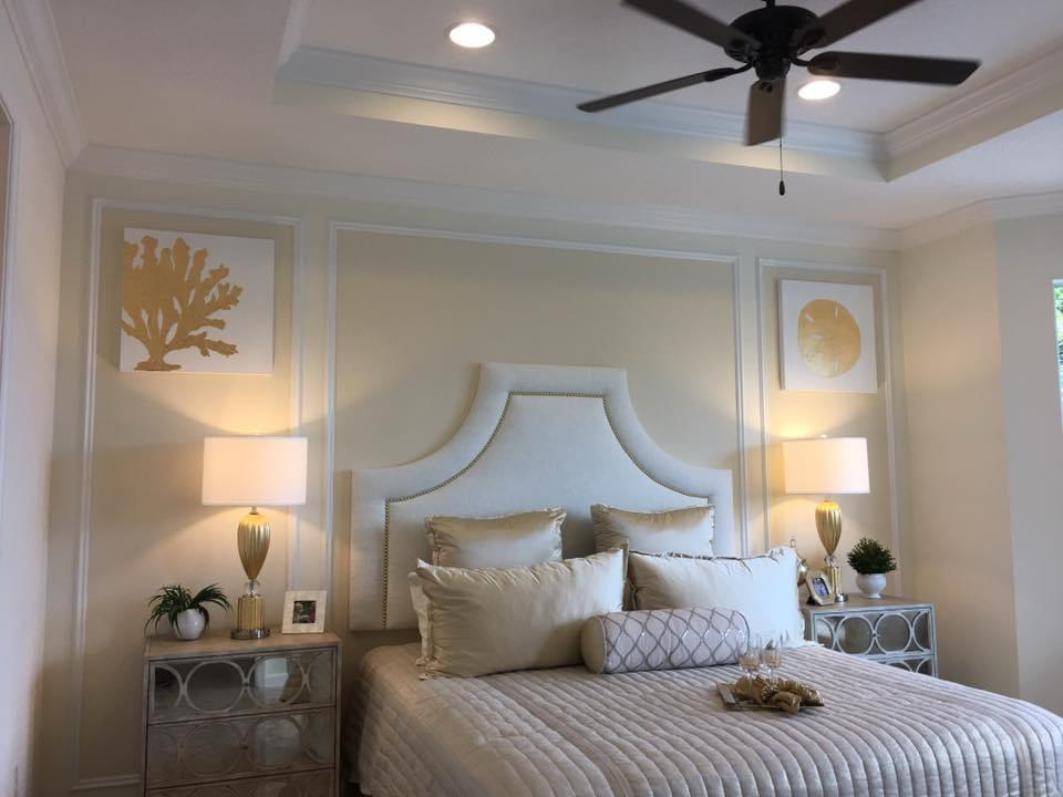 Elegant cream master bedroom with tray ceiling