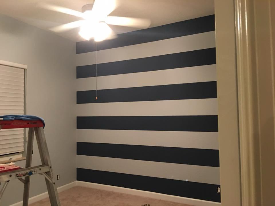 Navy and white horizontal striped accent wall